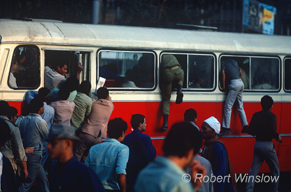 People piling into a Public Bus, Thrir Square,  Cairo, Egypt, Africa