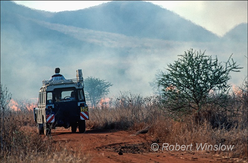 Driving Through a Brush Fire, Tsavo West, Kenya, Africa, 1983